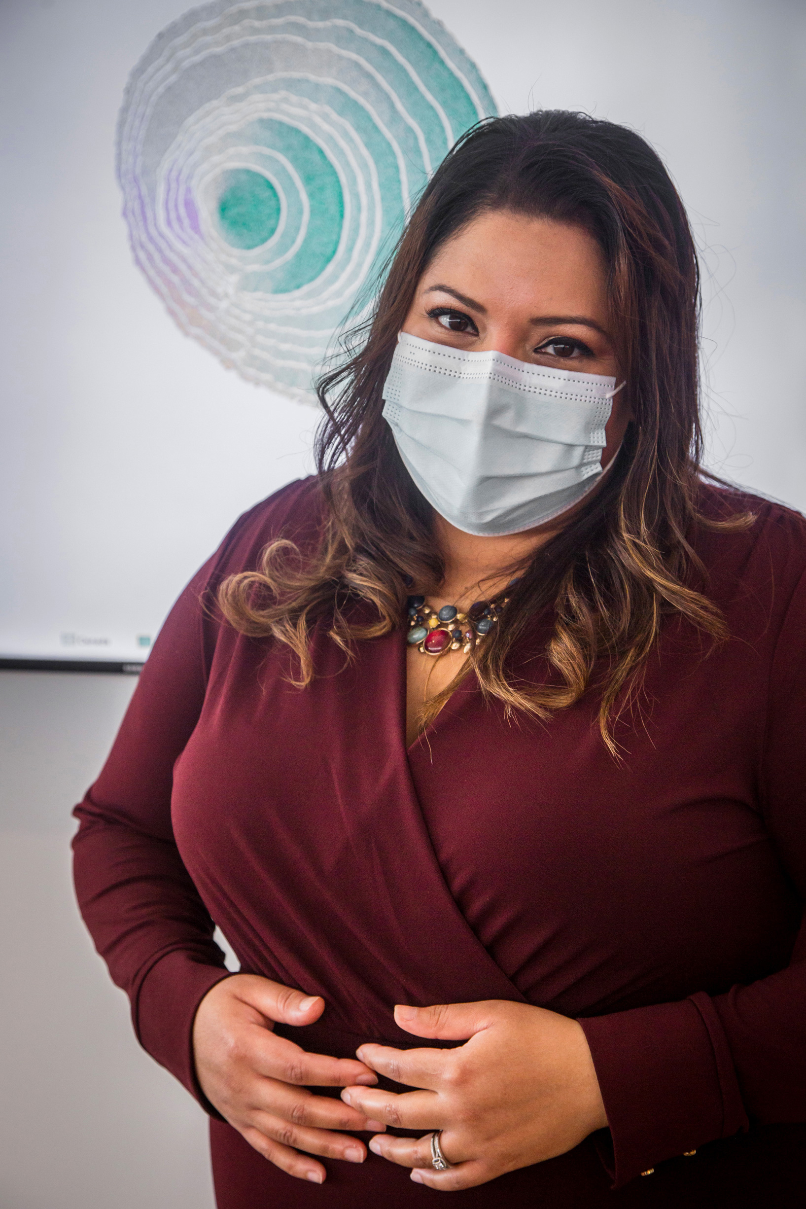 woman standing with a mask on