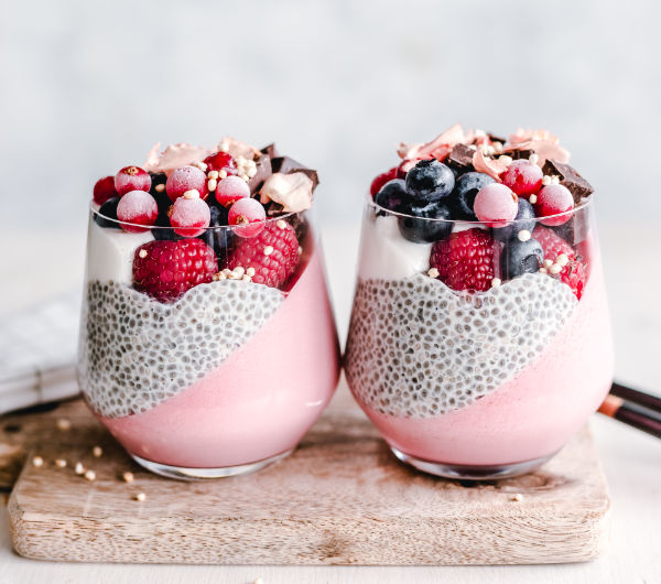 healthy fruit drinks topped with chocolate and fruit